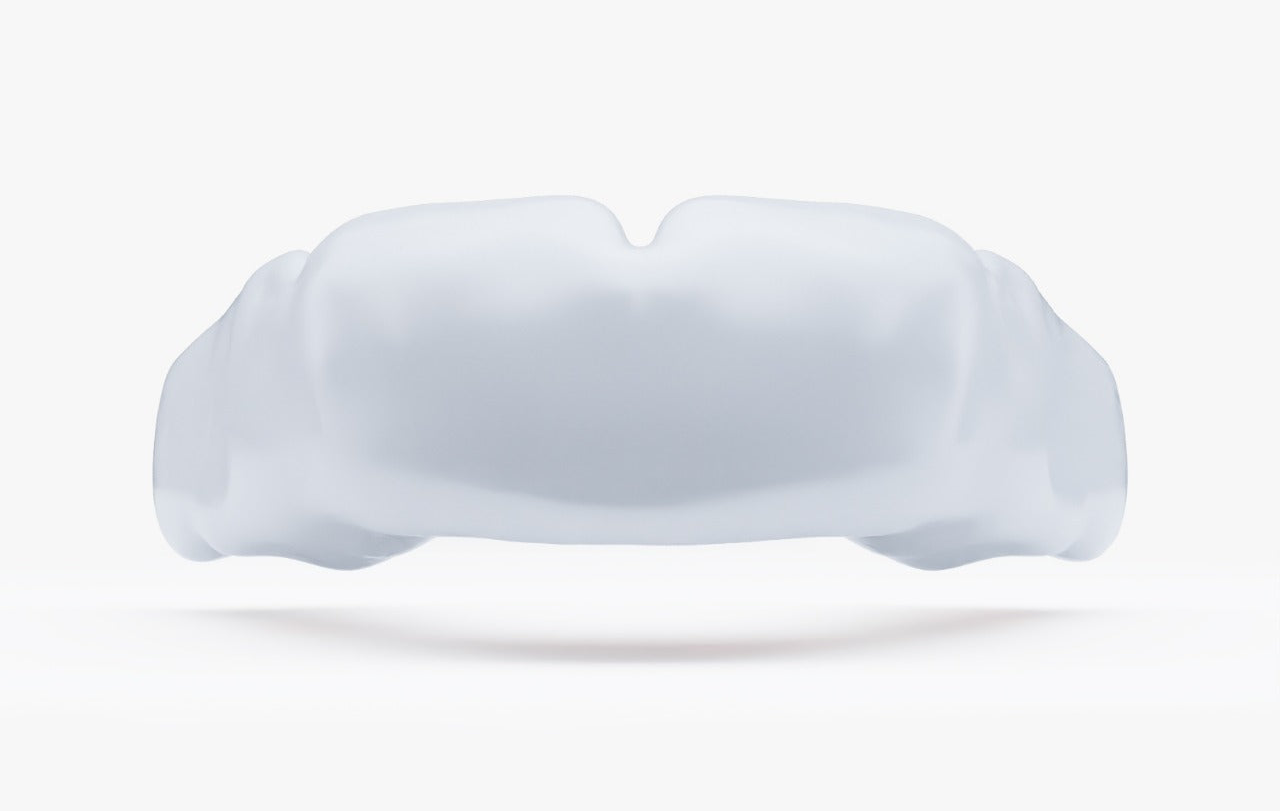 White custom sports mouth guard on a white background