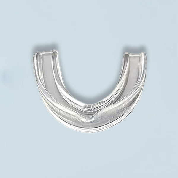 clear impression tray for mouth guards on a white background